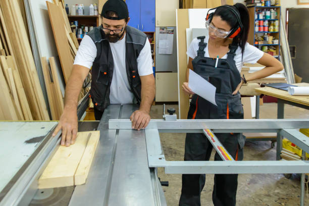 istock A Carpenters with Professional Work Tools are Working with a Circular Saw. 1386961151