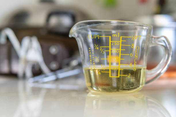 cooking oil on measuring cup for baking use