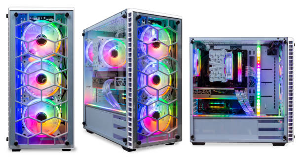 set collection of colorful custom gaming pc computer with dark tinted glass windows and rgb rainbow led lighting isolated white background stock photo