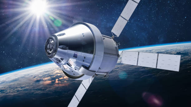 istock Orion spacecraft flight in space on orbit of Earth. Sci-fi wallpaper. Artemis space program. Expedition to Moon. Spaceship with astronauts. Elements of this image furnished by NASA 1386968115