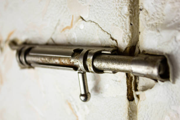 istock Old door lock. Close the latch lock. 1386973538