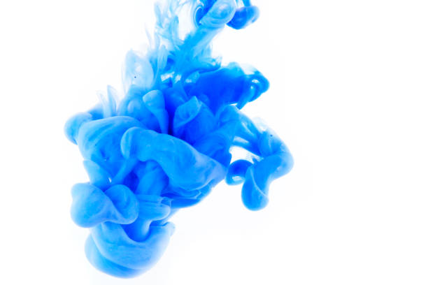photo of paint falling into the water