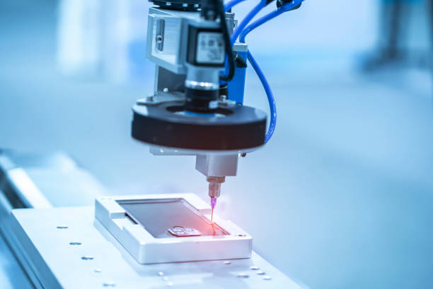 istock High precision and technology of nozzle device and needle of automatic glue dispenser machine (glue injection) for mobile phone 1386983080