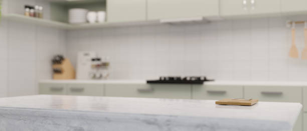 istock Close-up, White marble kitchen countertop or kitchen island with copy space 1386985910