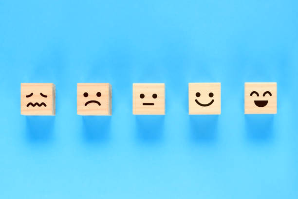 istock Building blocks with five levels of expressions painted on them. 1386987119