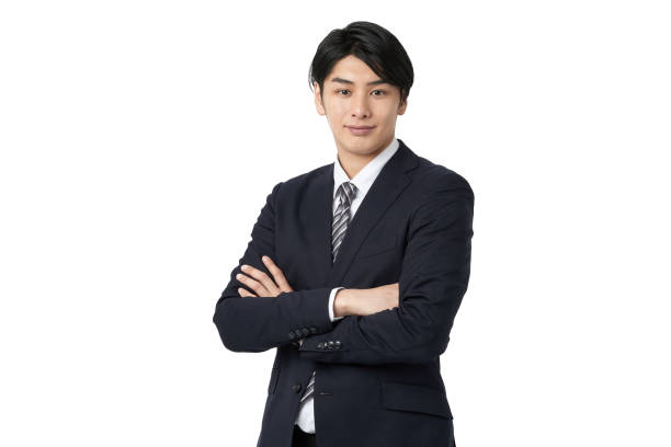 Asian businessman with confidence and arms crossed stock photo