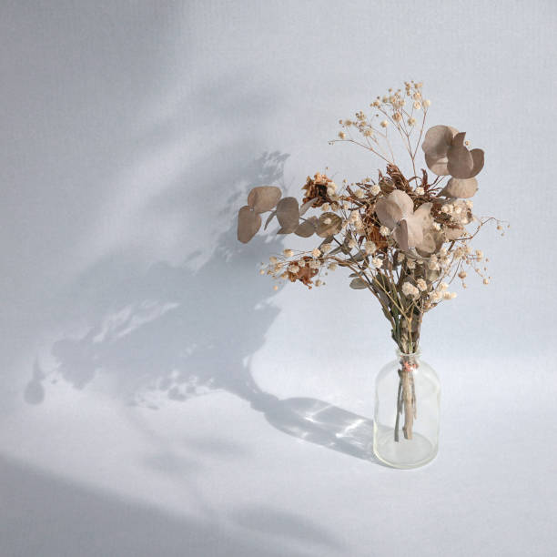 istock Dried flower bouquet in a glass vase. 1386990773