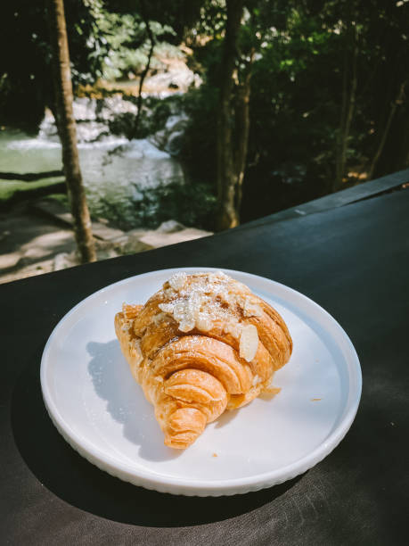 istock Croissant near the stream 1386991077