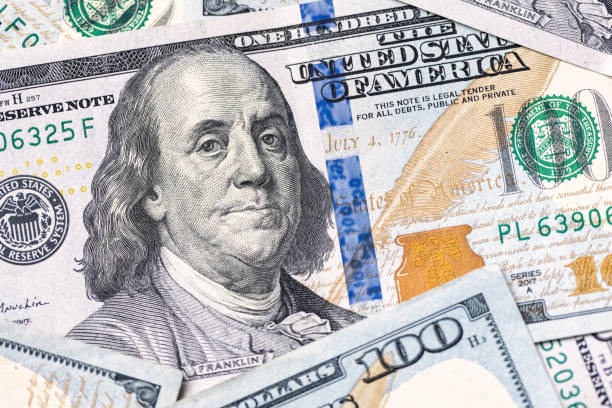 istock $100 Bills Money US Currency Background 1386994116