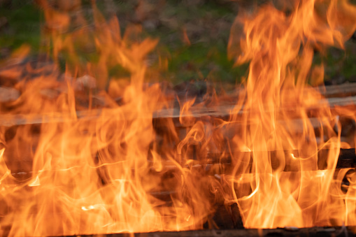 Fire flames engulfing burring wood pallet