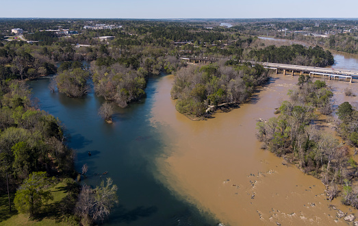 The clear Lower Saluda and muddy Broad rivers come together to form the Congaree River in Columbia, SC