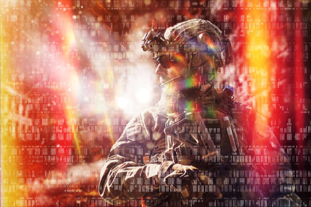 War concept. A bearded soldier in a special forces uniform fighting an enemy in a forest area. Selective focus