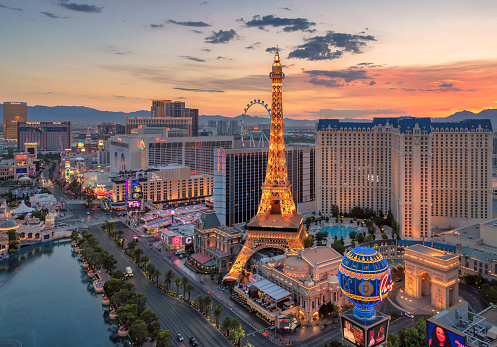 World famous Vegas Strip at sunrise on  October 25, 2021 in Las Vegas, Nevada. The Las Vegas is home to the largest hotels and casinos in the world.