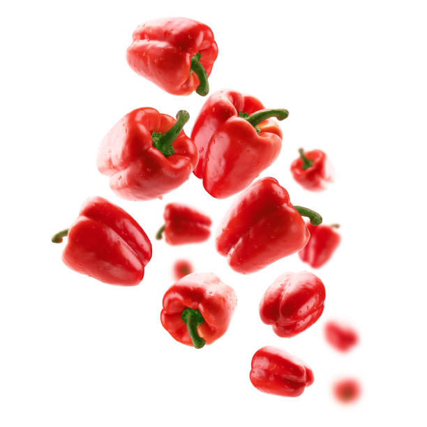 istock Red paprika levitates on a white background 1387005867