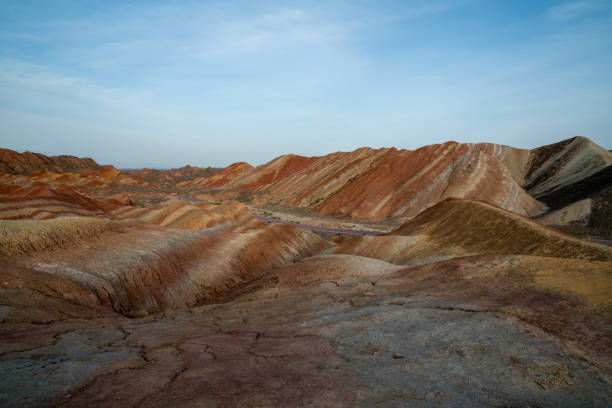 Zhangye Danxia National Geopark - Gansu Province, China. Chinese Danxia multicolor danxia landform, rainbow hills, unusual colored rocks, sandstone erosion, layers of Red, Yellow and Orange stripes.