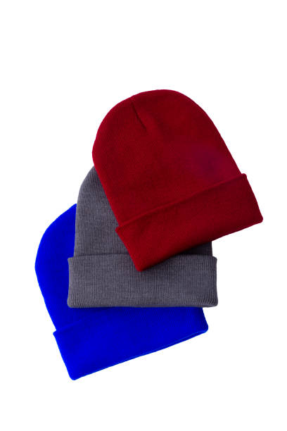 istock Group of colorful Wool hats isolated on white 1387008833