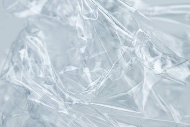 plastic transparent cellophane, white texture background - close up shiny merchandise rough imagens e fotografias de stock