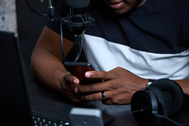 istock Close up image of men's hands typing on a smartphone in a chat 1387012049