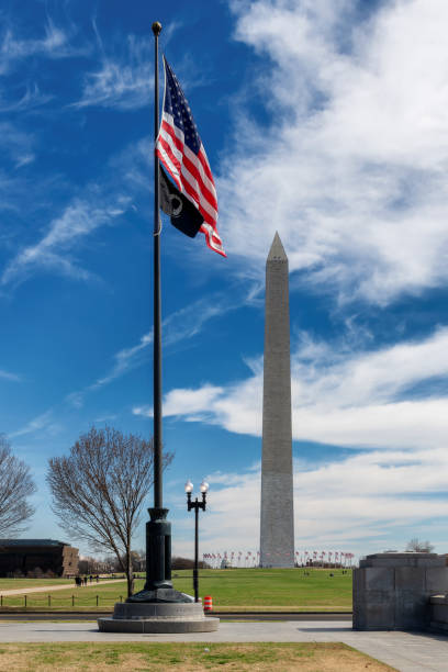 istock Washington Monument and American flag 1387013279