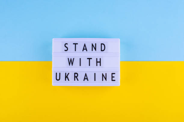 istock Stop war in Ukraine concept with flag colors 1387013389