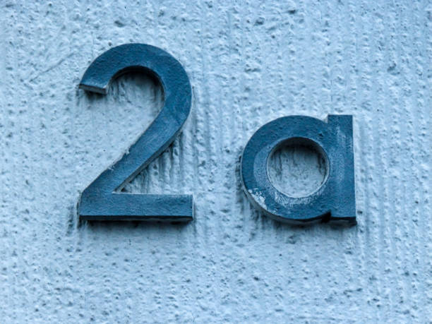 istock Metal house number on a wall 1387016319