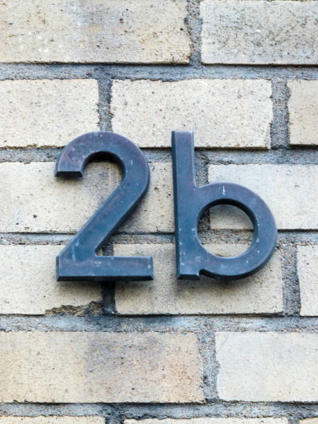 istock Metal house number on a wall 1387016343
