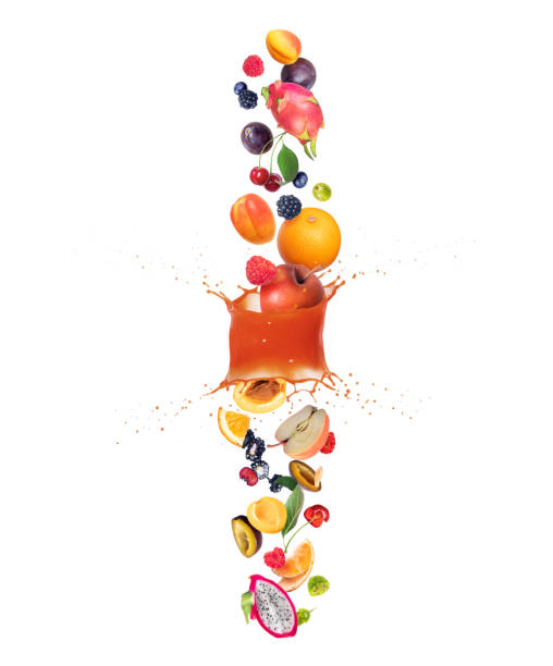 istock Different fruits and berries are falling down through splashes of juice 1387018825