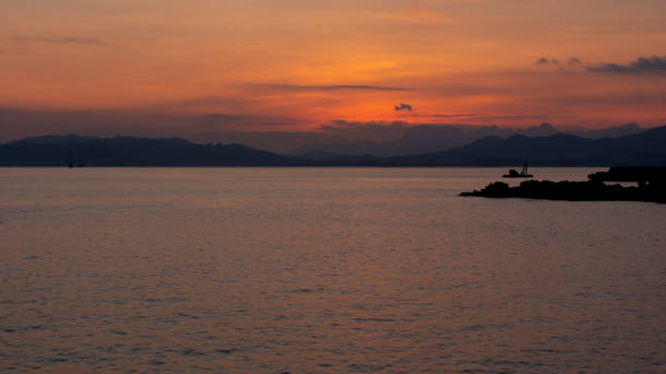 istock Beautiful orange sky during sunset in Langkawi 1387019831