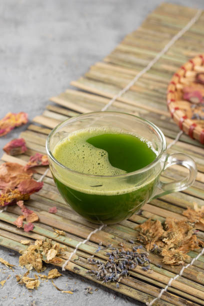 istock Green matcha tea in a glass cup 1387019865