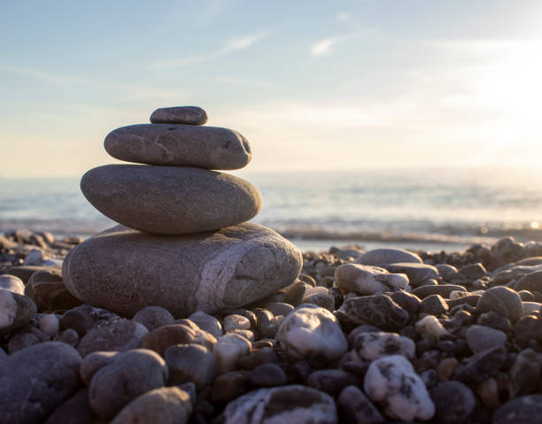 istock Pile of stones at the beach. 1387023523