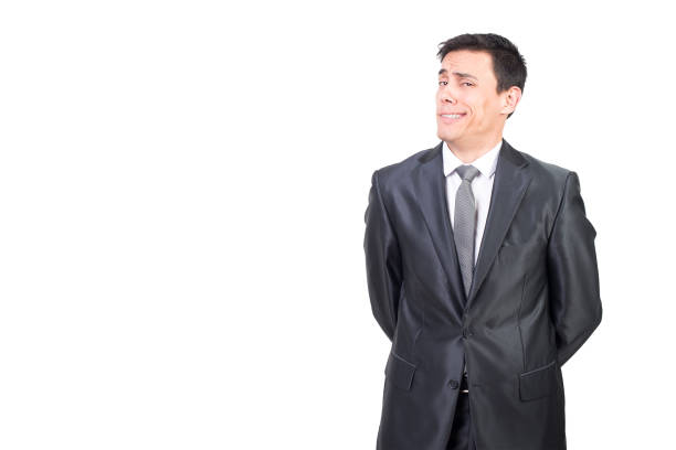 Studio shot of handsome Persian businessman with suit against white background