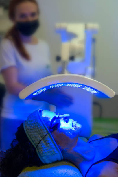 istock beauty session with a phototherapy machine 1387029561
