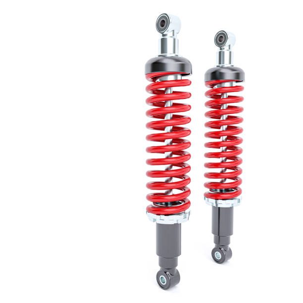 istock car shock absorbers with red spring on the white background. 1387031214
