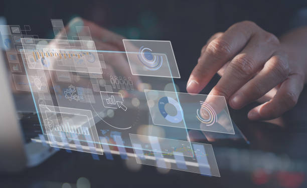 istock Data scientists, Business woman touching on digital tablet computer analyzing business report, financial graph on futuristic virtual interface screen 1387033656