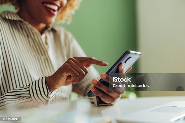 Close Up Photo Of Woman Hands Using Mobile Phone In The Office Stock Photo - Download Image Now
