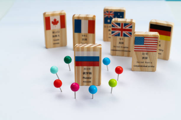 Dominos with national flags on the table.
