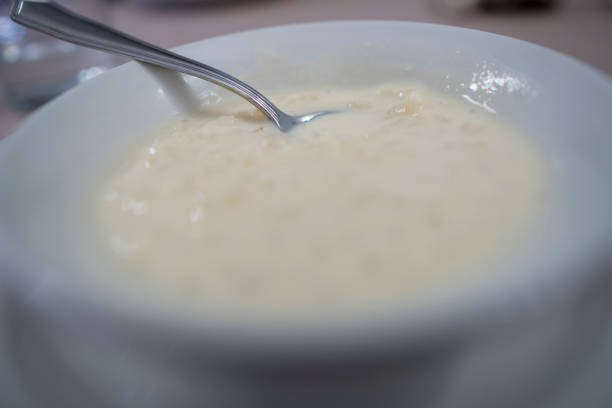 istock Rice pudding sprinkled with nutmeg in an individual white bowl. 1387035808
