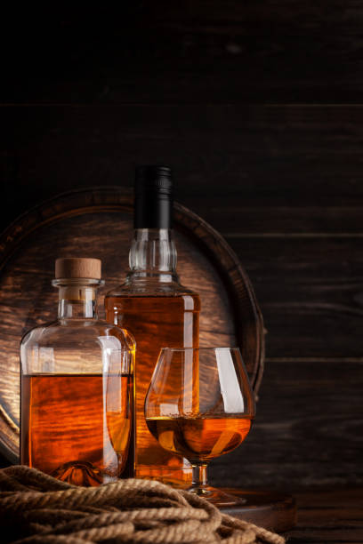 istock Glass and bottles with cognac 1387039552