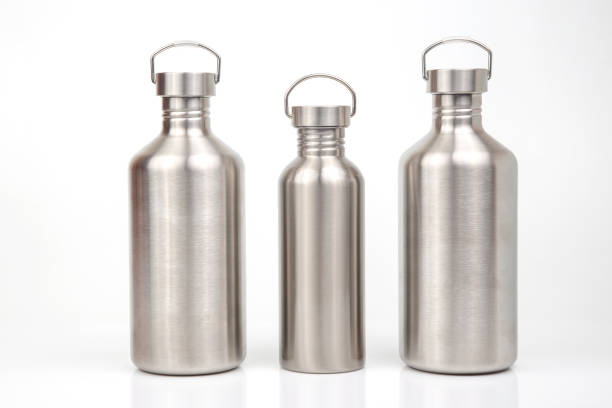 istock Steel flasks for water and drinks on a white background. Survival hiking gear 1387040991