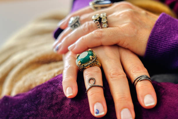 istock women's hands and various rings 1387042188