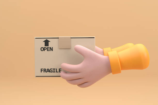istock A parcel cardboard box in a delivery man hands. Delivery service concept. 1387042435