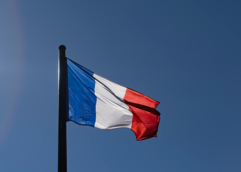 French national flag blowing in the wind