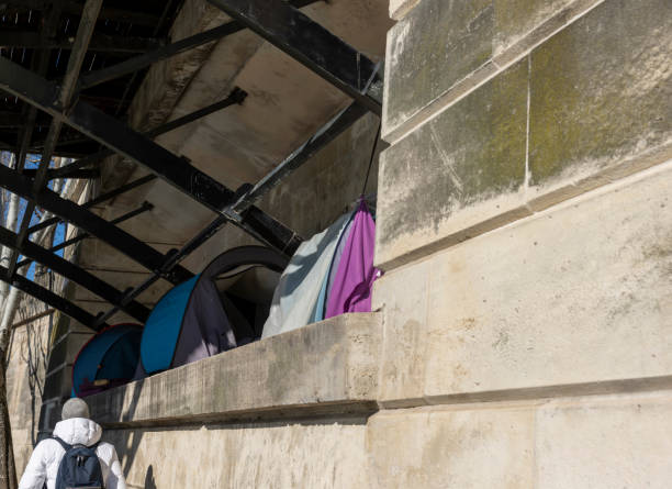 Homeless under a bridge in Paris