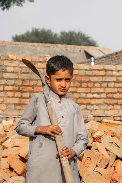 Photo of Poor children are forced to work construction