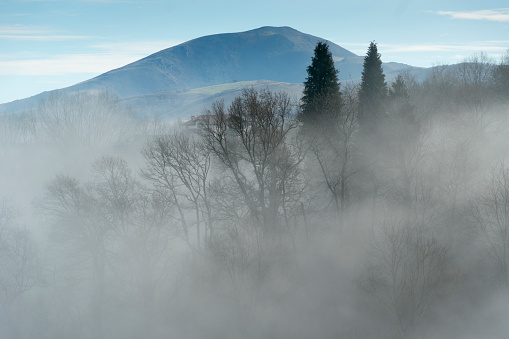 Sunrise  with clouds and mist from Ziga village in Batzan mountains Navarre Spain