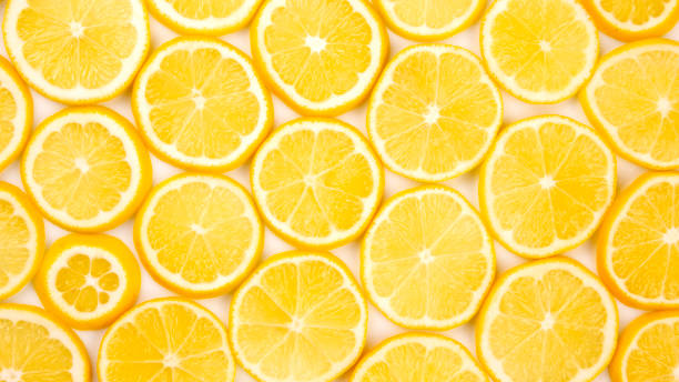 istock sliced citrus lemons half on a light background 1387050771