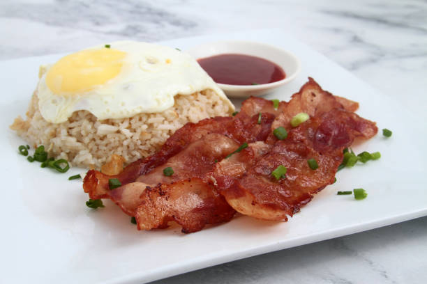 istock Freshly cooked Filipino food called Bacsilog 1387051384
