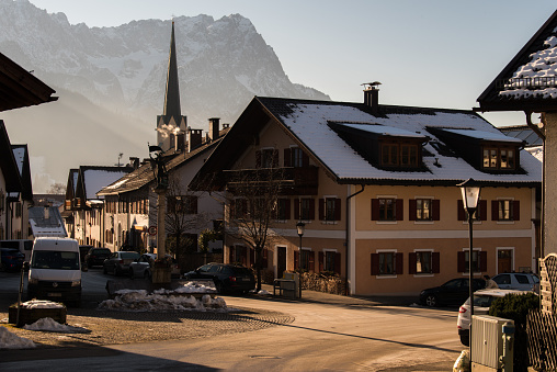 Garmisch-Partenkirchen, Germany - December 22,2021: Street view of the Garmisch-Partenkirchen on sunny winter day.