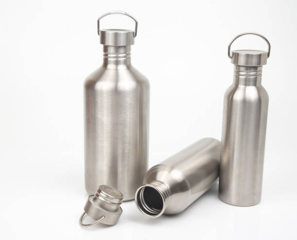 istock Steel flasks for water and drinks on a white background. Survival hiking gear 1387054511