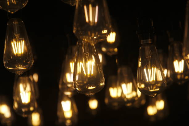 istock Bunch of lit light bulbs 1387055803